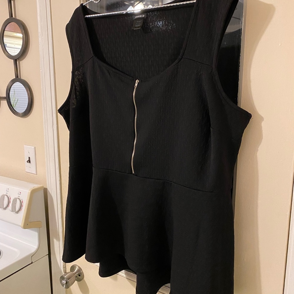 My FAVORITE black peplum top from Torrid 😍 - Picture 2 of 5